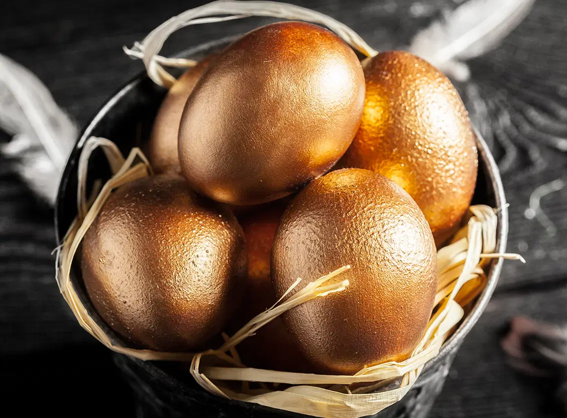 Golden eggs in a basket